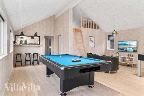 Aktivitätsraum im Luxusferienhaus Nr. 733 mit 7 Schlafzimmern und Platz für 18 Gäste.