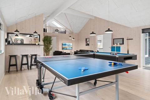 Neben den vielen schönen Stunden, die man im Poolbereich des Hauses verbringen kann, bietet das Luxusferienhaus 732 auch Spielevergnügen bei Billard/Tischtennis und Darts