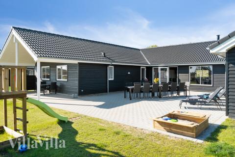 Genießen Sie einen Grillabend auf der Terrasse des Luxusferienhauses Nr. 731 in Deutschland