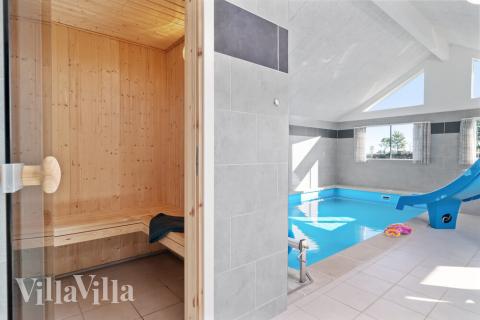 Genießen Sie die heiße Sauna im Luxusferienhaus Nr. 729 für 24 Personen