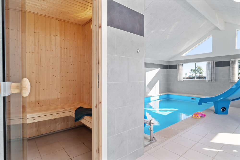 Genießen Sie die heiße Sauna im Luxusferienhaus Nr. 729 für 24 Personen