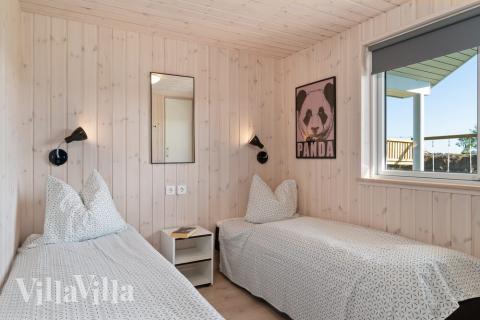 Eines der 9 Schlafzimmer im Luxusferienhaus Nr. 729