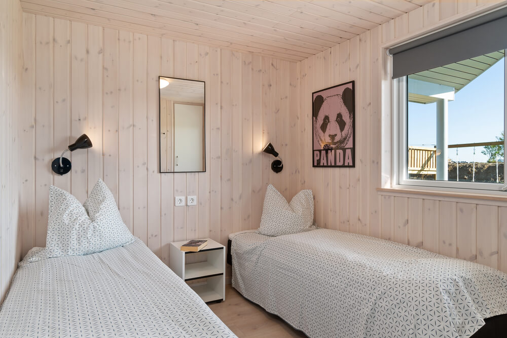 Eines der 9 Schlafzimmer im Luxusferienhaus Nr. 729
