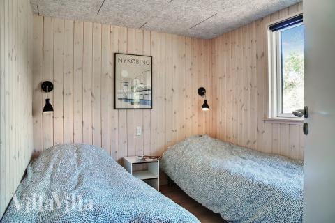 Eines der 7 Schlafzimmer im Luxusferienhaus Nr. 503