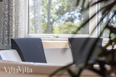 Genießen Sie den warmen Whirlpool im Luxusferienhaus Nr. 503 in Lolland/Falster/Mön