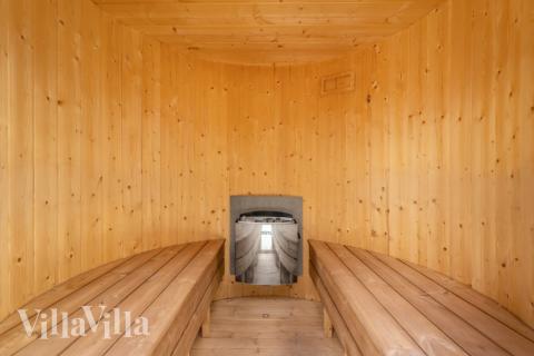 Genießen Sie die heiße Sauna im Luxusferienhaus Nr. 519 für 14 Personen