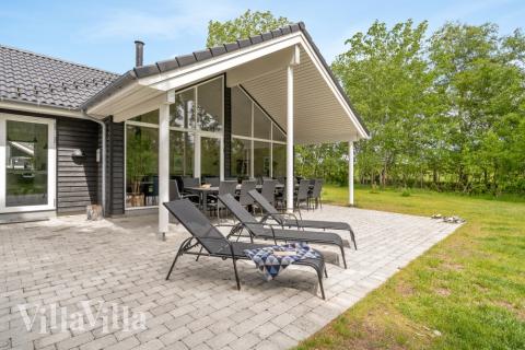 Das Luxusferienhaus Nr. 519 hat eine tolle Terrasse, die mit hochwertigen Gartenmöbeln für 14 Personen ausgestattet ist.