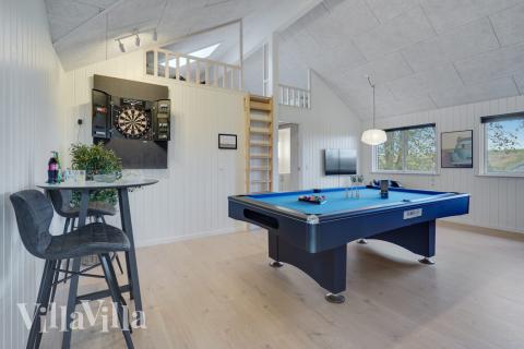 Aktivitätsraum im Luxusferienhaus Nr. 511 mit 5 Schlafzimmern und Platz für 14 Gäste.