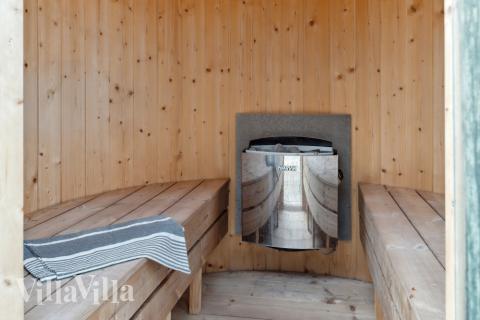 Genießen Sie die heiße Sauna im Luxusferienhaus Nr. 511 für 14 Personen