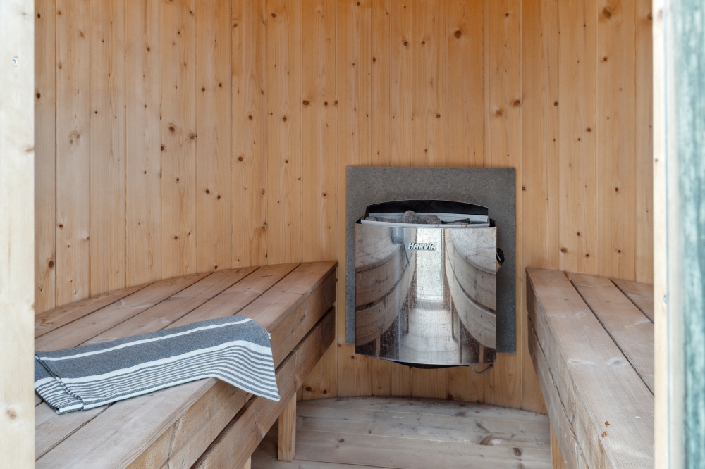 Genießen Sie die heiße Sauna im Luxusferienhaus Nr. 511 für 14 Personen