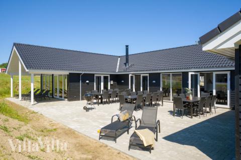 Das Luxusferienhaus Nr. 491 hat eine tolle Terrasse, die mit hochwertigen Gartenmöbeln für 30 Personen ausgestattet ist.