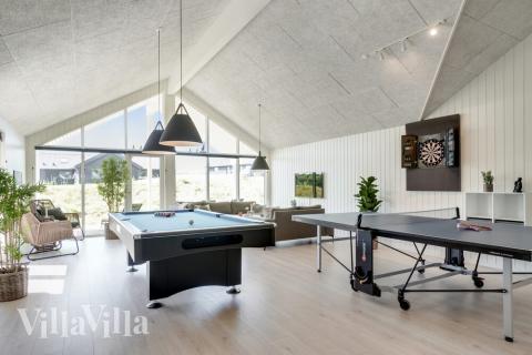 Neben den vielen schönen Stunden, die man im Poolbereich des Hauses verbringen kann, bietet das Luxusferienhaus 491 auch Spielevergnügen bei Billard/Tischtennis und Darts