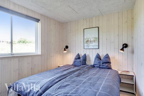 Eines der 12 Schlafzimmer im Luxusferienhaus Nr. 491