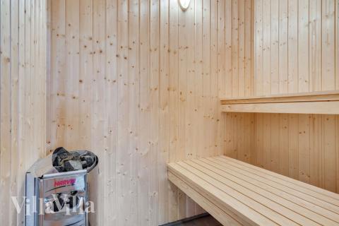 Genießen Sie die heiße Sauna im Luxusferienhaus Nr. 513 für 16 Personen