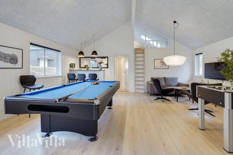 Das Luxusferienhaus 509 für 16 Personen hat einen großen Aktivitätsraum mit u. a. Billard und Darts