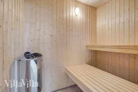 Genießen Sie die heiße Sauna im Luxusferienhaus Nr. 509 für 16 Personen