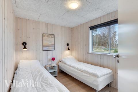 Eines der 7 Schlafzimmer im Luxusferienhaus Nr. 502