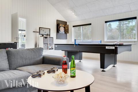 Neben den vielen schönen Stunden, die man im Poolbereich des Hauses verbringen kann, bietet das Luxusferienhaus 502 auch Spielevergnügen bei Billard/Tischtennis und Darts