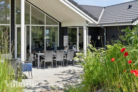 Das Luxusferienhaus Nr. 502 hat eine tolle Terrasse, die mit hochwertigen Gartenmöbeln für 18 Personen ausgestattet ist.