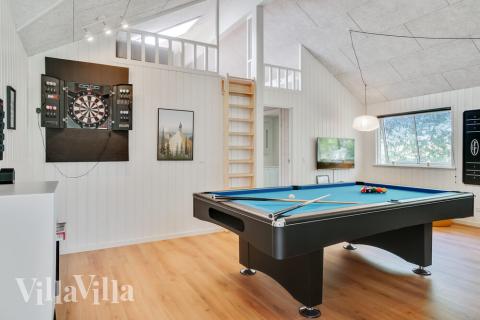Aktivitätsraum im Luxusferienhaus Nr. 515 mit 5 Schlafzimmern und Platz für 14 Gäste.