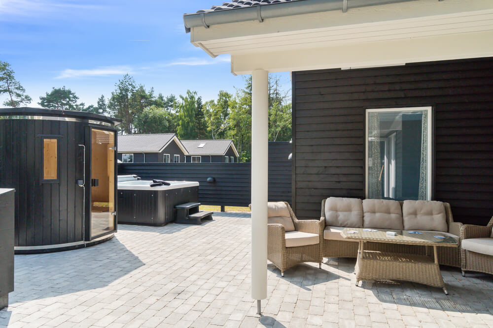 Zu dem attraktiven Ferienhaus Nr. 515 in Lolland/Falster/Mön gehört auch ein tolles Angebot im Außenbereich, z. B. Spieleturm und Schaukeln