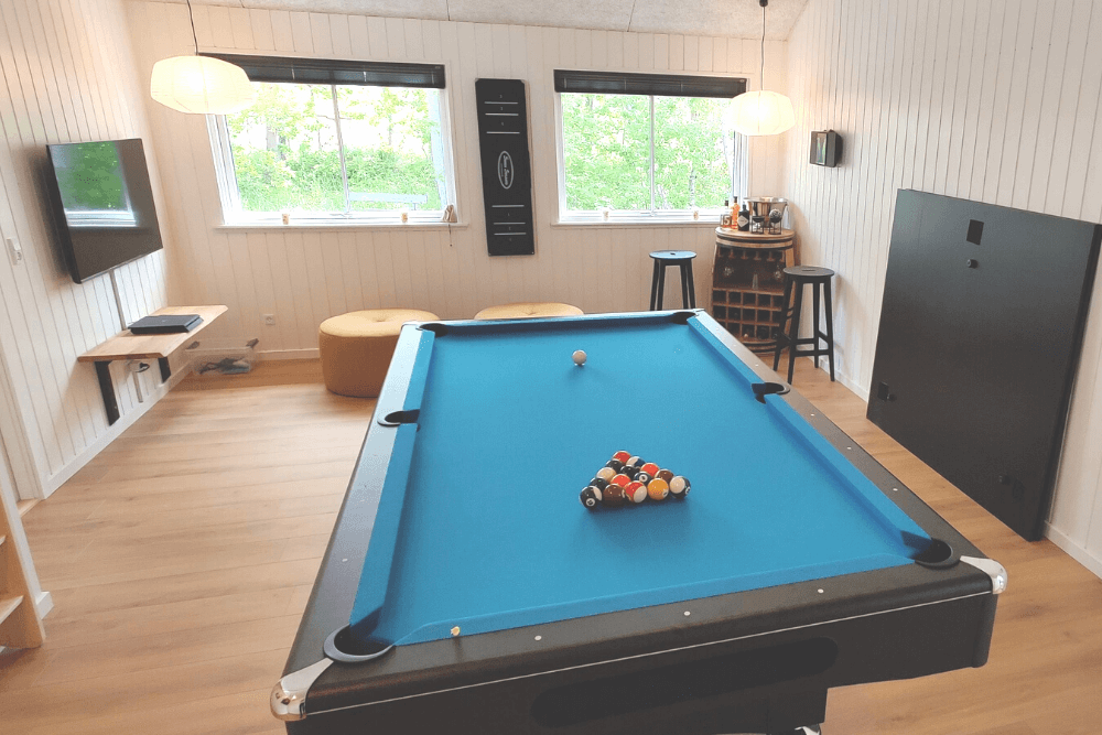 Das Luxusferienhaus 515 für 14 Personen hat einen großen Aktivitätsraum mit u. a. Billard und Darts