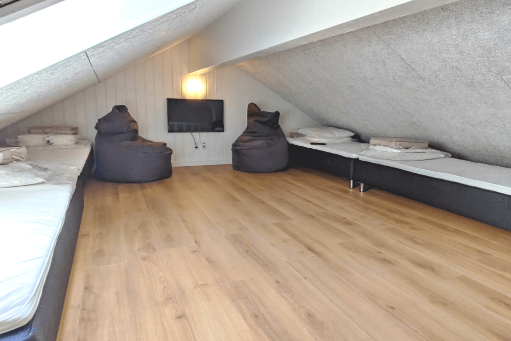 Einige der 14 Schlafgelegenheiten befinden sich im Luxusferienhaus Nr. 515 auf dem ausgebauten Dachboden