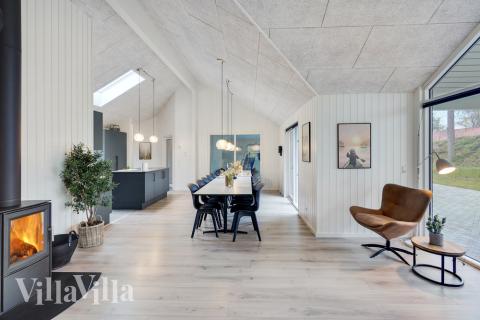 Aufenthaltsraum mit Platz für 18 im Luxusferienhaus Nr. 517.