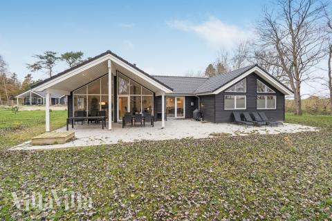 Dieses schöne Poolhaus Nr. 507 mit Platz für 18 Personen liegt in Lolland/Falster/Mön