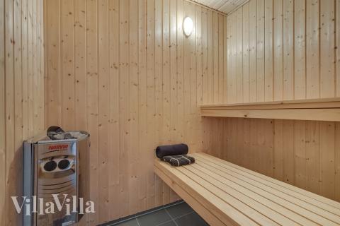 Genießen Sie die heiße Sauna im Luxusferienhaus Nr. 507 für 18 Personen