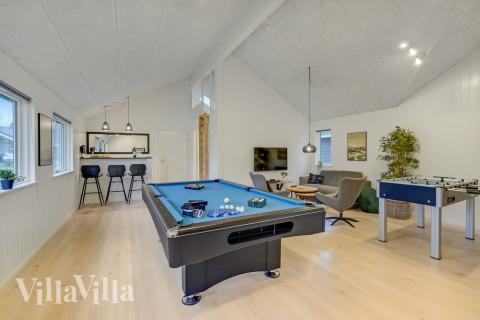 Neben den vielen schönen Stunden, die man im Poolbereich des Hauses verbringen kann, bietet das Luxusferienhaus 507 auch Spielevergnügen bei Billard/Tischtennis und Darts