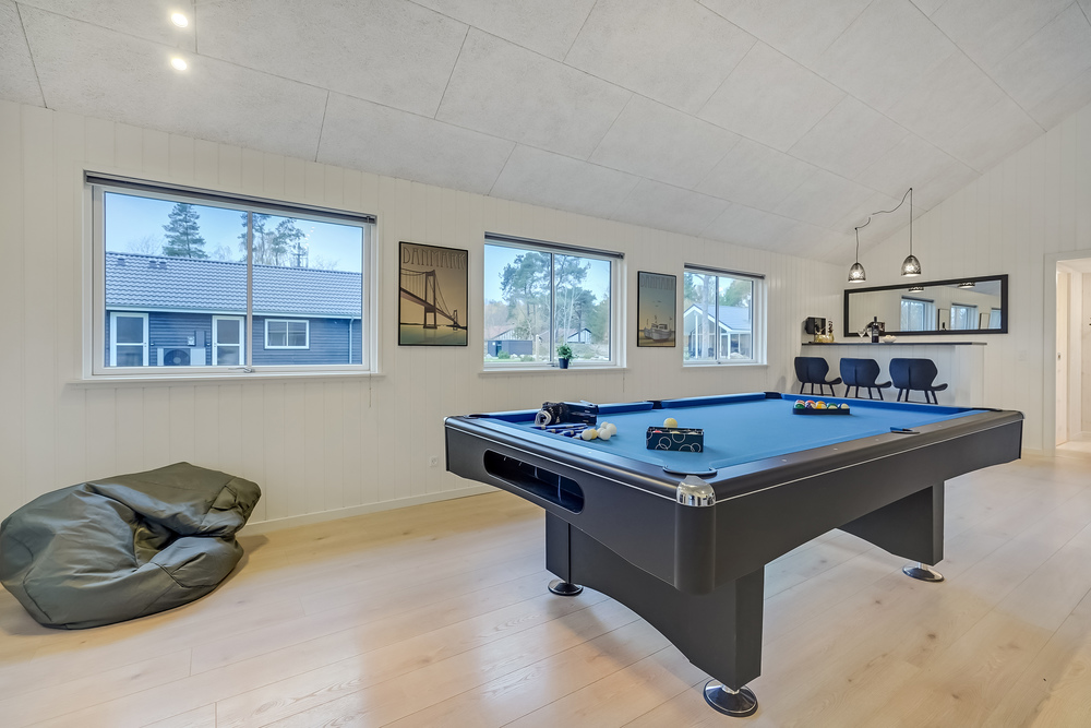 Das Luxusferienhaus 507 für 18 Personen hat einen großen Aktivitätsraum mit u. a. Billard und Darts