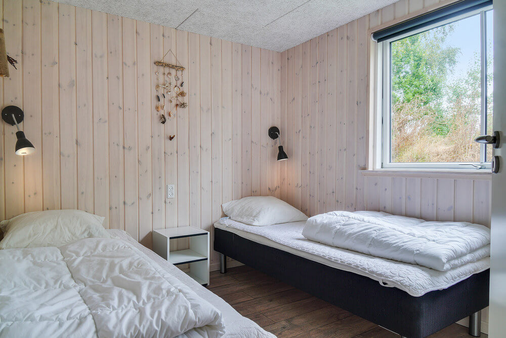 Eines der 7 Schlafzimmer im Luxusferienhaus Nr. 506