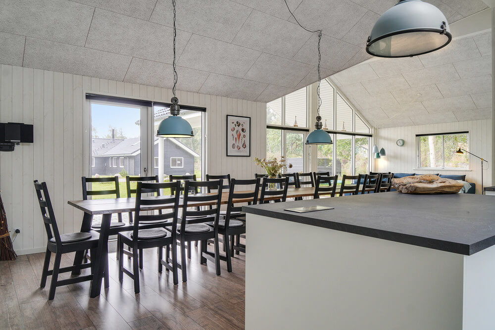 Aufenthaltsraum mit Platz für 18 im Luxusferienhaus Nr. 506.