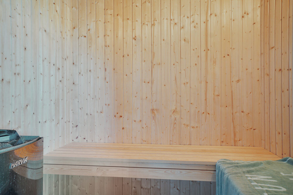 Genießen Sie die heiße Sauna im Luxusferienhaus Nr. 497 für 26 Personen