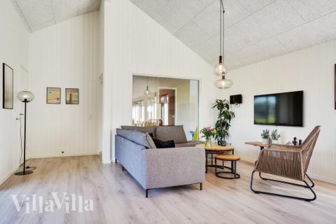 Aufenthaltsraum mit Platz für 26 im Luxusferienhaus Nr. 497.