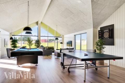 Neben den vielen schönen Stunden, die man im Poolbereich des Hauses verbringen kann, bietet das Luxusferienhaus 497 auch Spielevergnügen bei Billard/Tischtennis und Darts