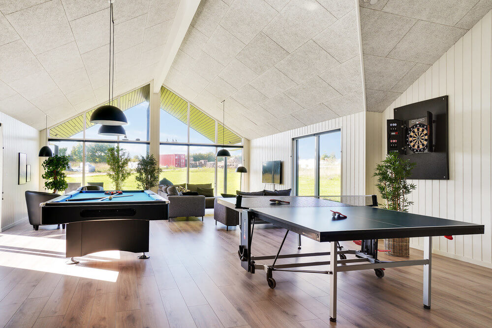 Neben den vielen schönen Stunden, die man im Poolbereich des Hauses verbringen kann, bietet das Luxusferienhaus 497 auch Spielevergnügen bei Billard/Tischtennis und Darts