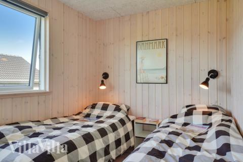 Eines der 10 Schlafzimmer im Luxusferienhaus Nr. 497