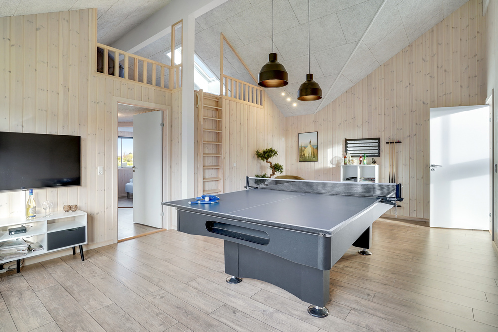 Das Luxusferienhaus 522 für 14 Personen hat einen großen Aktivitätsraum mit u. a. Billard und Darts