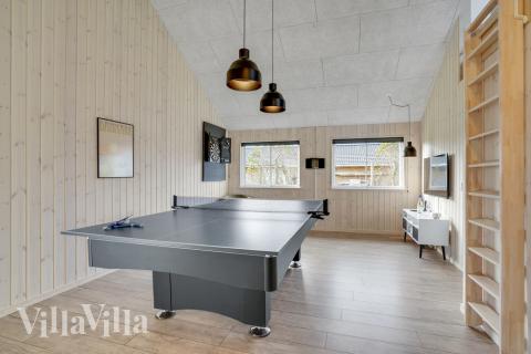 Neben den vielen schönen Stunden, die man im Poolbereich des Hauses verbringen kann, bietet das Luxusferienhaus 522 auch Spielevergnügen bei Billard/Tischtennis und Darts