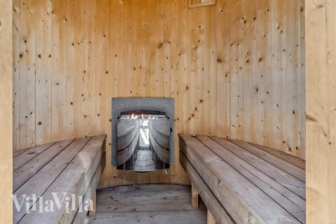 Genießen Sie die heiße Sauna im Luxusferienhaus Nr. 522 für 14 Personen
