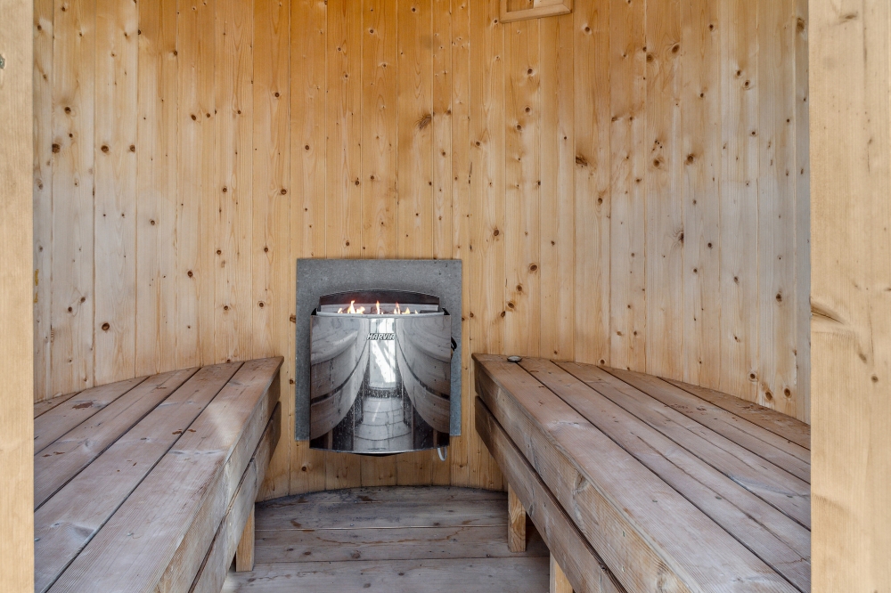 Genießen Sie die heiße Sauna im Luxusferienhaus Nr. 522 für 14 Personen