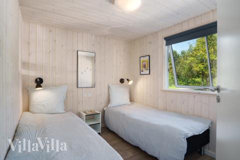 Eines der 7 Schlafzimmer im Luxusferienhaus Nr. 498