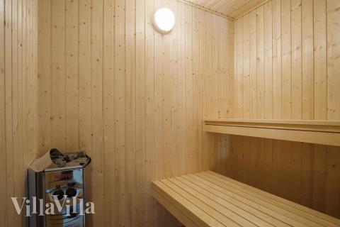Genießen Sie die heiße Sauna im Luxusferienhaus Nr. 498 für 18 Personen