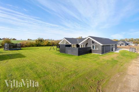 Dieses schöne Poolhaus Nr. 521 mit Platz für 16 Personen liegt in Südjütland