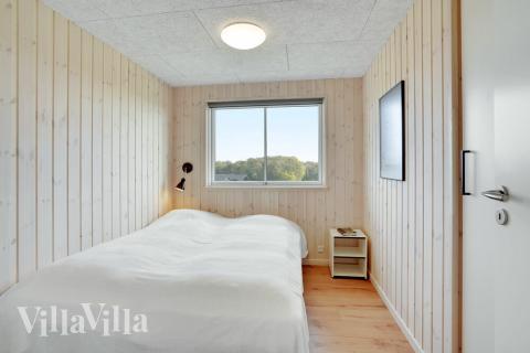 Eines der 6 Schlafzimmer im Luxusferienhaus Nr. 521