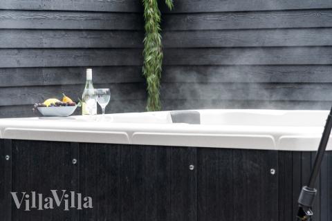 Das Luxusferienhaus Nr. 521 bietet u. a. einen tollen Whirlpool