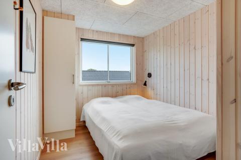 Eines der 10 Schlafzimmer im Luxusferienhaus Nr. 496