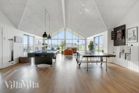 Neben den vielen schönen Stunden, die man im Poolbereich des Hauses verbringen kann, bietet das Luxusferienhaus 496 auch Spielevergnügen bei Billard/Tischtennis und Darts